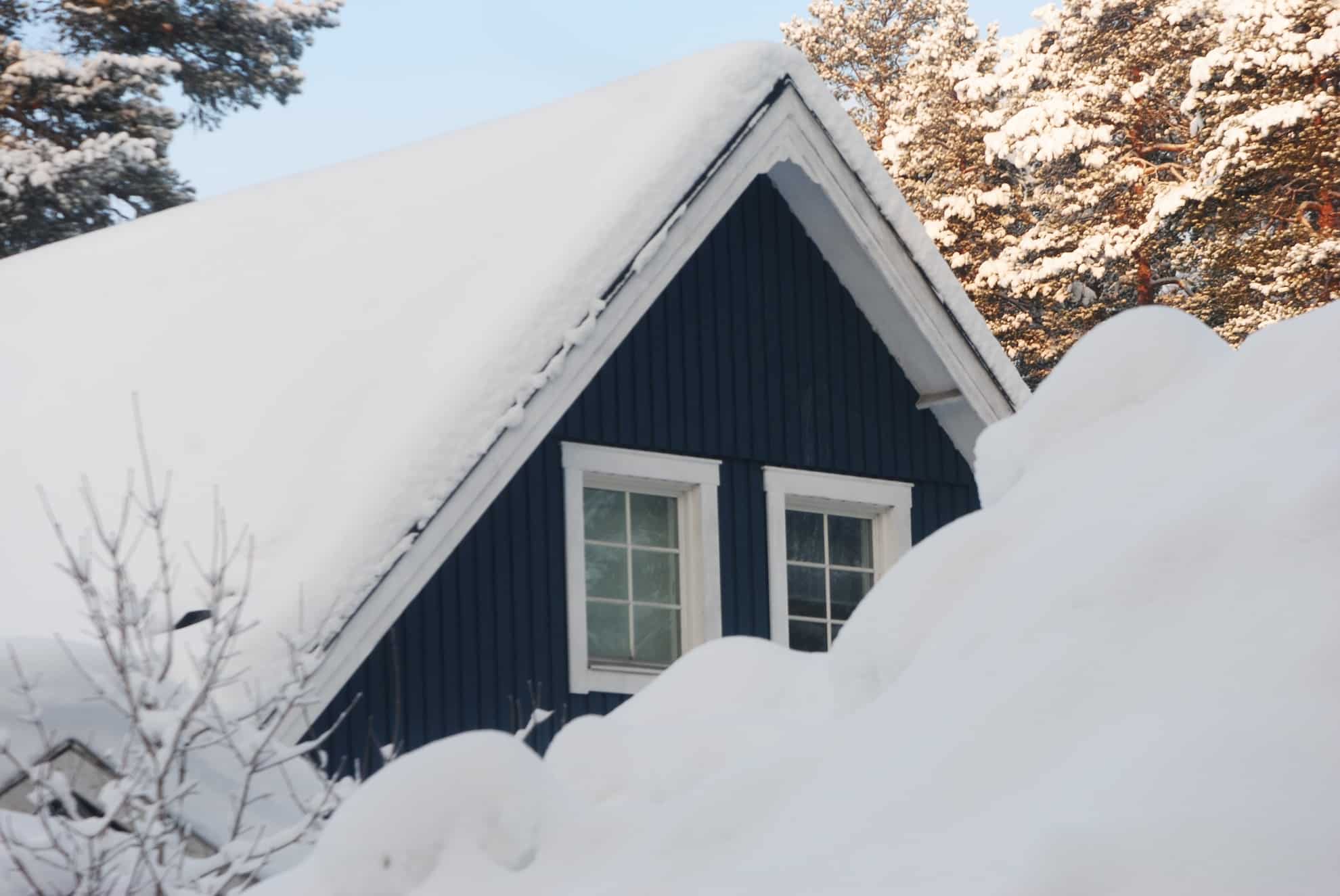 stuffy house in winter covered in snow