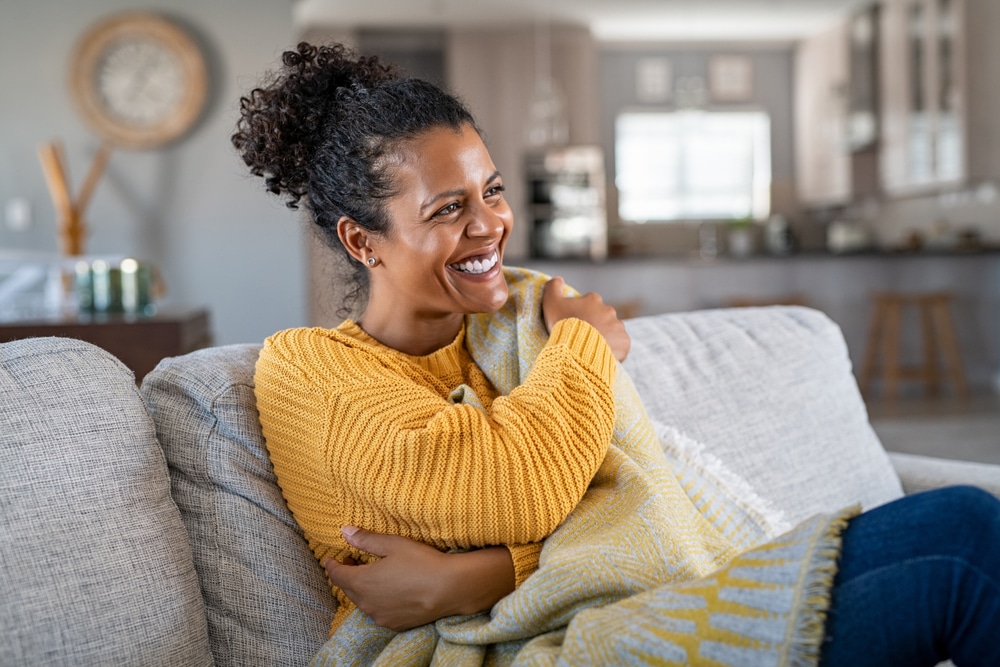 Person comfortable on couch